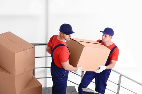 Loading furniture into a van for a Bromley removal job