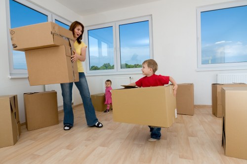 Helper loading furniture for a Bromley house move