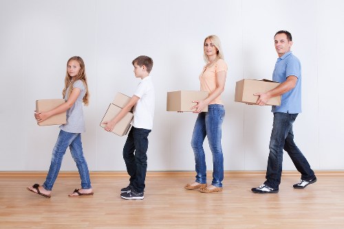 Movers handling goods carefully during a relocation service