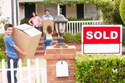 Staff member handling furniture safely during a house removal